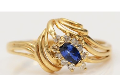 A gold sapphire and diamond floral dress ring, rubbed marks,...
