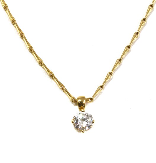 A gold single stone diamond pendant
