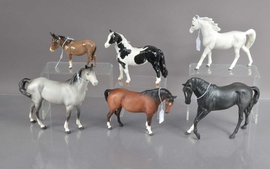 A group of five Beswick pottery horses and a donkey and one Japanese pottery horse