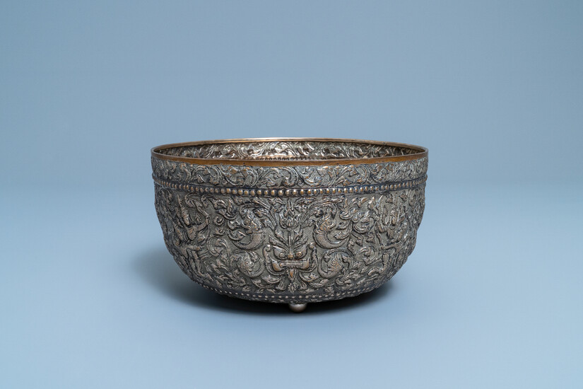 A hammered gilt silver tripod bowl, Thailand, 19/20th C.