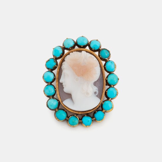 A hardstone cameo brooch with a detachable turquoise frame