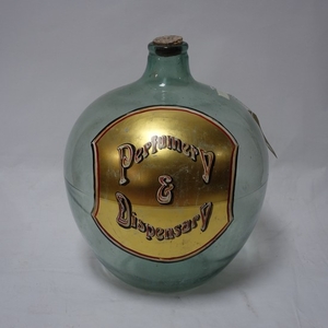 A large antique glass perfumery & dispensary bottle, H.50cm