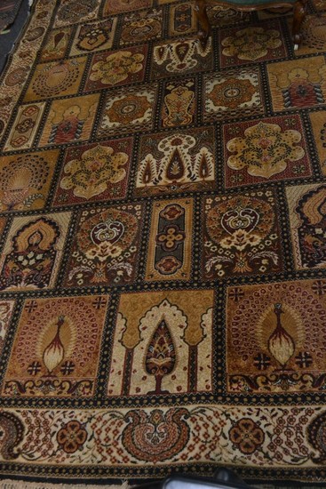 A large rug 12ft x 8ft approx oriental in design