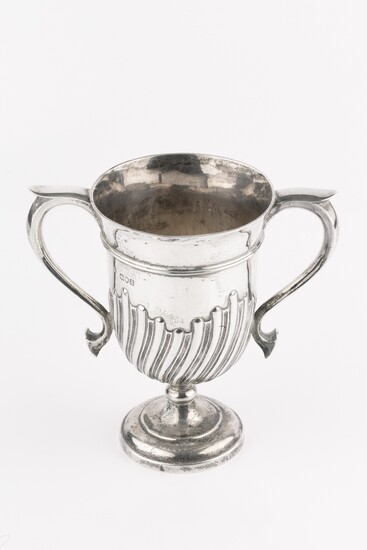 A late Victorian silver twin handled trophy cup