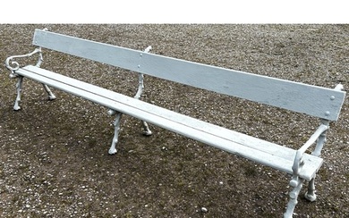 A long park/railway waiting bench with painted finish, woode...