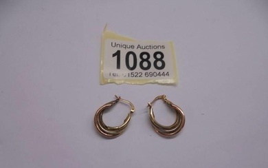 A pair of 9ct rose, white and yellow gold three hoop earring...