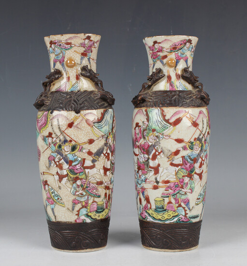 A pair of Chinese famille rose enamelled crackle glazed porcelain vases, late 19th century, each pai