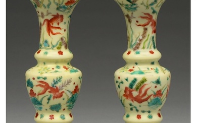 A pair of Chinese yellow ground vases, possibly 19th c, enam...