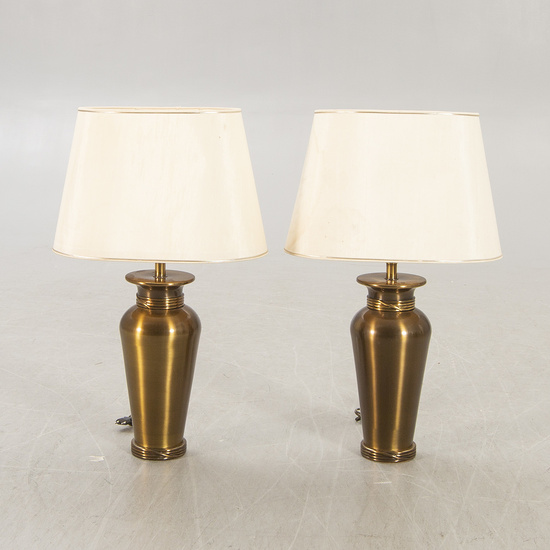 A pair of Deknut metall table lamps later part of the n20th century