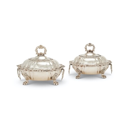 A pair of George IV silver covered vegetable dishes by Sebas...