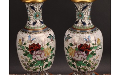 A pair of Japanese cloisonné enamel baluster vases, decorate...