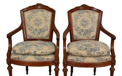 A pair of Louis XI Italian 18th century armchairs.