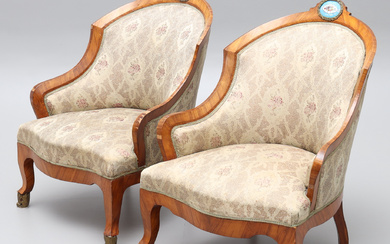 A pair of Louis XVL-style French armchairs, later 19th century.