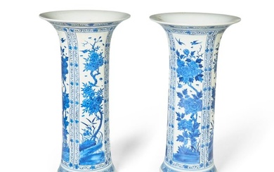 A pair of blue and white porcelain sleeve vases