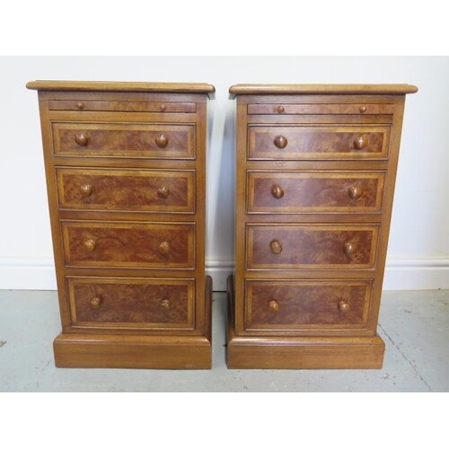 A pair of burr wood veneer four drawer bedside chests each w...