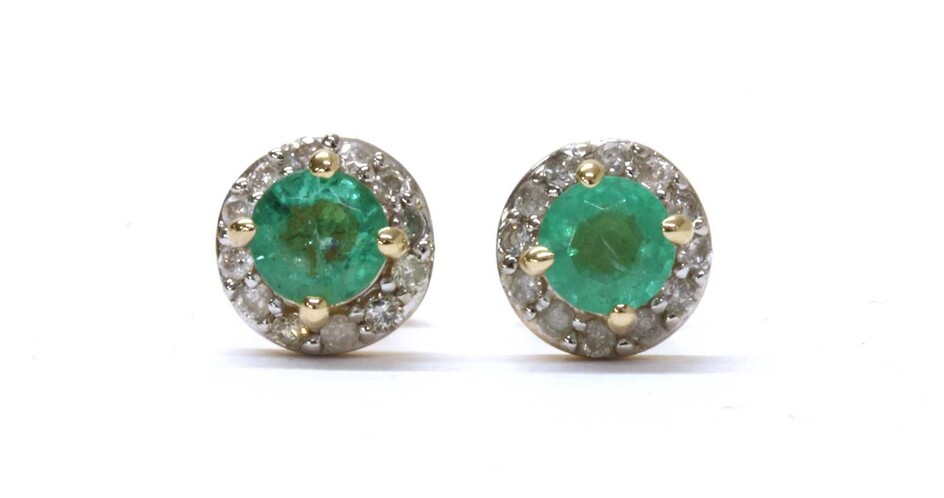 A pair of gold emerald and diamond cluster stud earrings