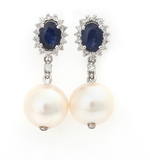 NOT SOLD. A pair of sapphire, diamond and pearl ear pendants each set with a...