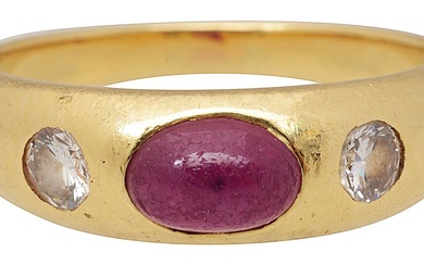A ruby and diamond three stone ring