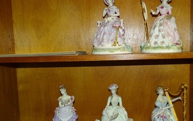 A set of four limited-edition Royal Worcester figurines from...