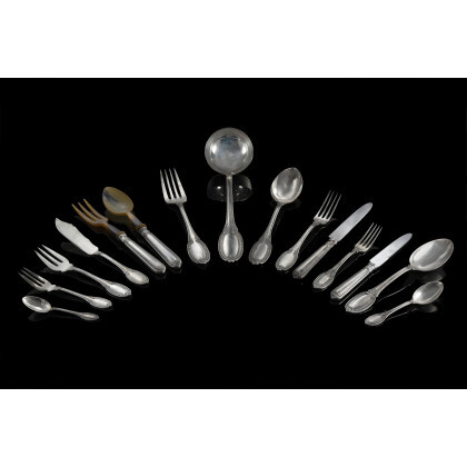 A silver flatware service comprising: twelve forks, spoons and knieves, twelve little forks and knieves, twelve fish forks and fish...