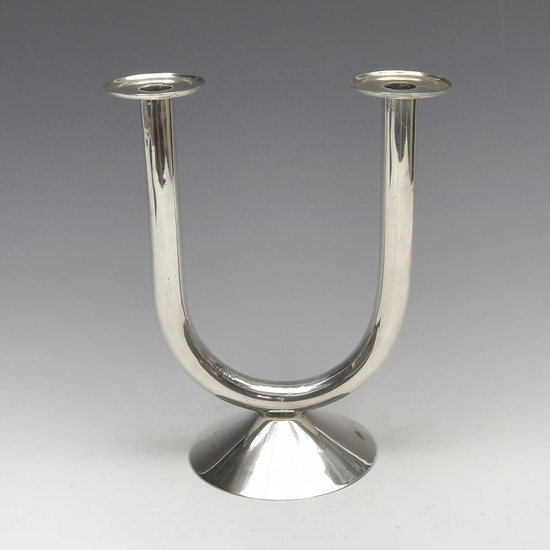 A silver-plated two-armed candlestick no. 1866, design A.D. Copier 1930,...