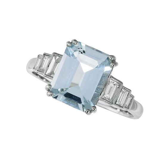 AN AQUAMARINE AND DIAMOND RING set with a step cut