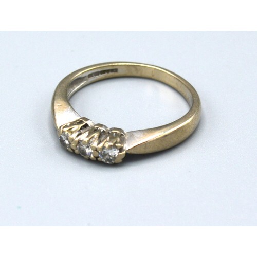 An 18ct White Gold Three Stone Diamond Ring with pierced set...