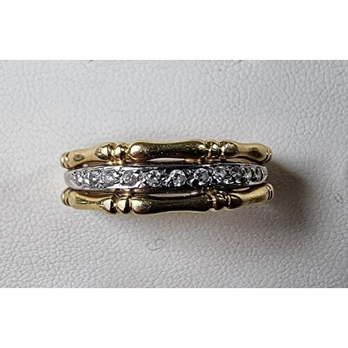 An 18ct gold and diamond set bamboo design ring, size R, 5.5...