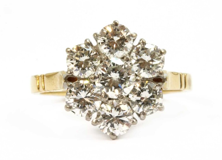 An 18ct gold diamond daisy cluster ring