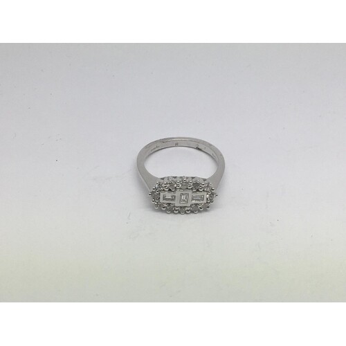 An 18ct white gold diamond 'boat' cluster ring set with roun...