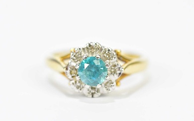 An 18ct yellow gold topaz and diamond floral cluster ring,...