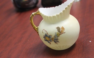An Antique Rudolstadt Porcelain Creamer