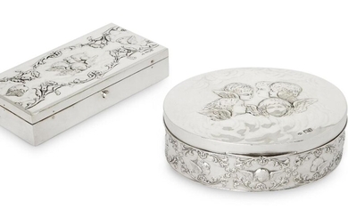 An Edwardian silver biscuit tin, London, 1901, William Comyns, of oval form, the hinged lid repousse decorated with winged putti, the sides with putti and foliate motifs, 13.5 x 17cm, together with a rectangular silver box with grooved compartments...
