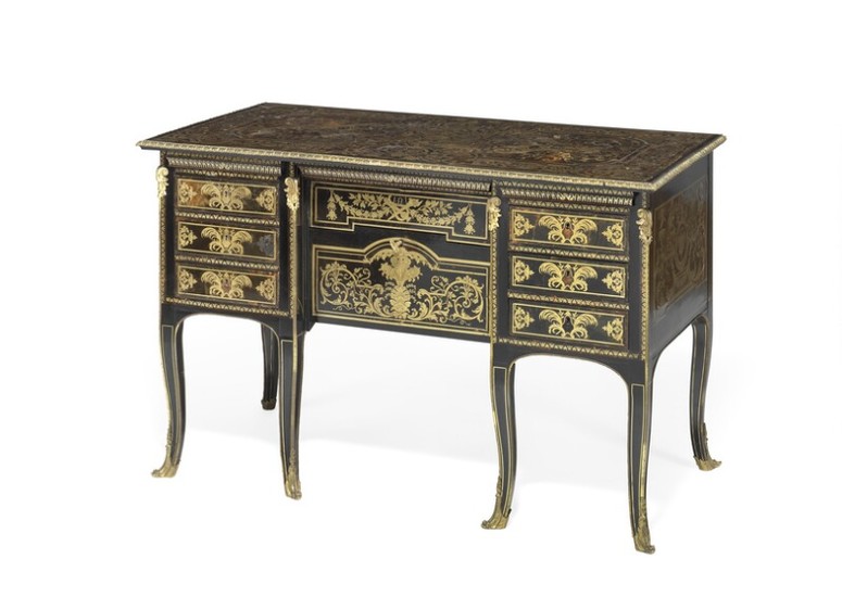 An ebonised and Boulle marquetry Bureau Mazarin table. Each lock stamped 'Secure Levere'. Mid-19th century, H. 85 cm. W. 135 cm. D. 70 cm.