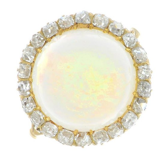 An opal and old-cut diamond cluster ring.Estimated