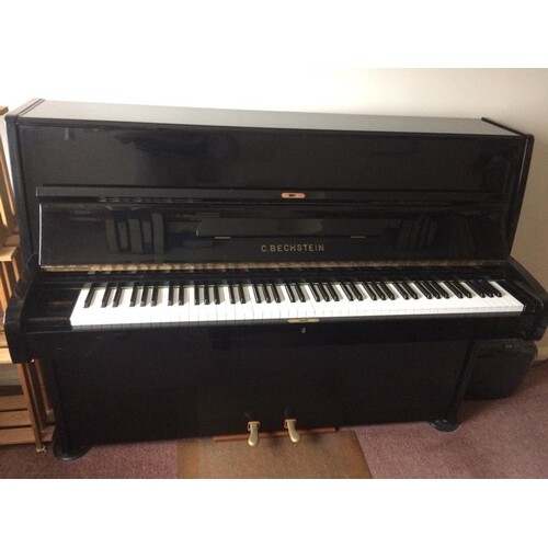 Bechstein (c1981) A Model 12N upright piano in a bright ebon...