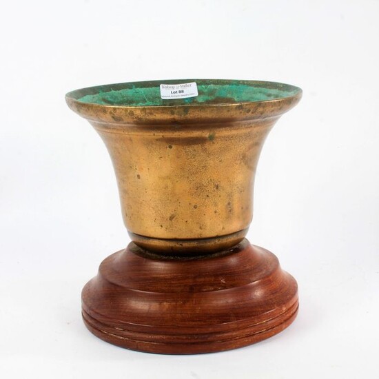 Brass ships bell, mounted with a wooden plinth (converted to a plant pot), the bell 20cm diameter