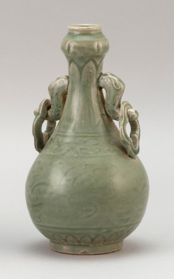 CHINESE CELADON STONEWARE VASE In pear form, with fish and mock ring handles, and a carved leaf and flower design on body. Height 8".