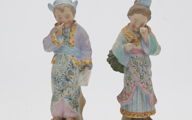 “Children with kimono”, a pair of biscuit vases, early 20th Century.