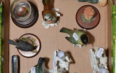 Collection of ceramic bird figurines and others