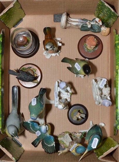 Collection of ceramic bird figurines and others