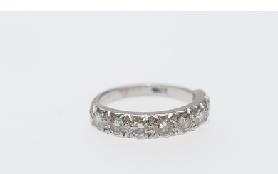 Diamond half eternity ring in 18ct white gold, set with eigh...