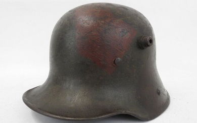 GERMANY. Stahlhelm M16 helmet with camouflaged finish in...
