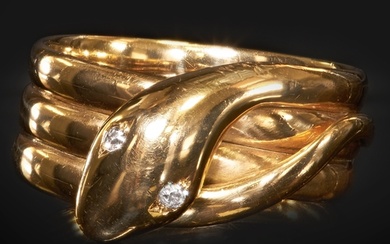 GOLD SNAKE RING, WITH DIAMOND EYES. Set with two old cut dia...