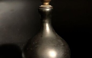 Georges JOUVE (1910-1964). Ceramic lamp with a matt black cover,...
