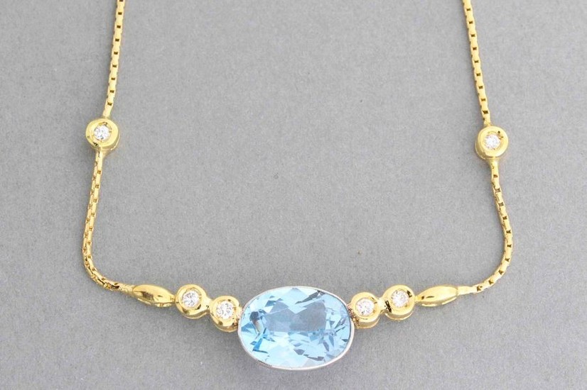 Gold necklace decorated with a golden aquamarine shoulder...