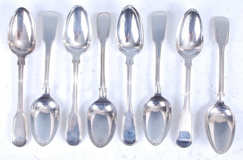 A harlequin set of eight 19th century silver serving spoons in the Fiddle & Thread pattern