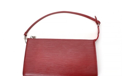 NOT SOLD. Louis Vuitton: An "Accessory Pouch" made of red Epi leather with silver toned...