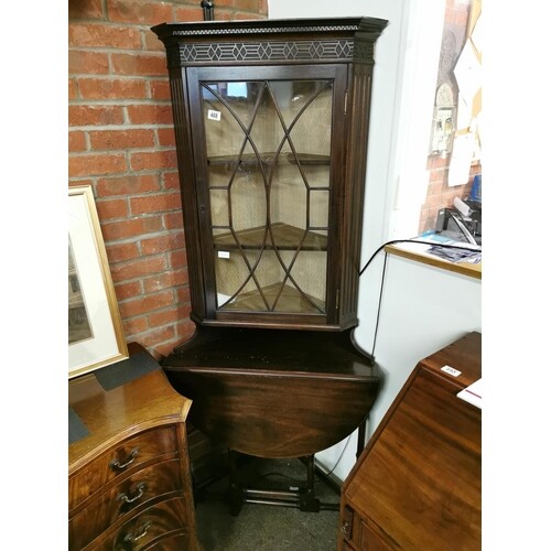 Mahogany glazed corner cupboard with fold out table below