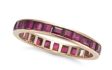 NO RESERVE - A RUBY ETERNITY RING set all around with a row of square step cut rubies, one stone not